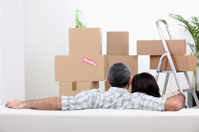 couple packing up a house to move 