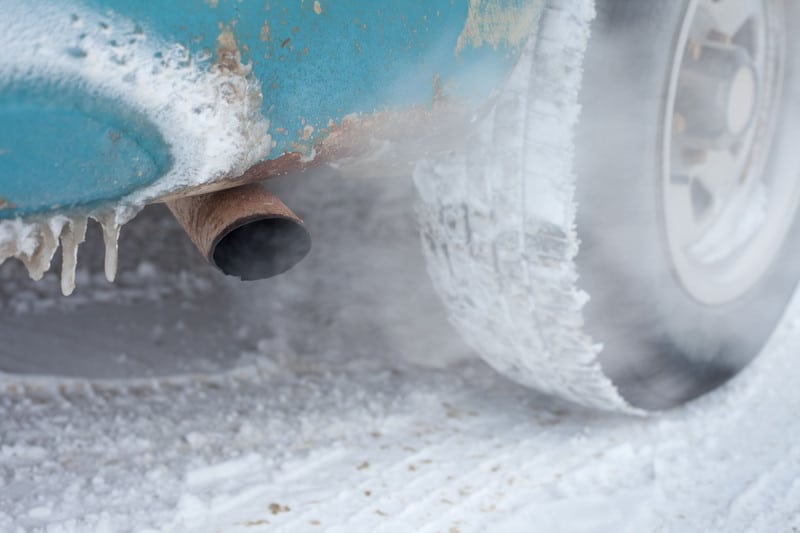 car driving on frozen bridge